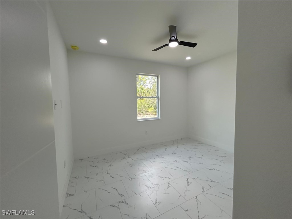 4204 East 24th Street Alva, FL 33920 - Photo 29 of 34 an empty room that has a window