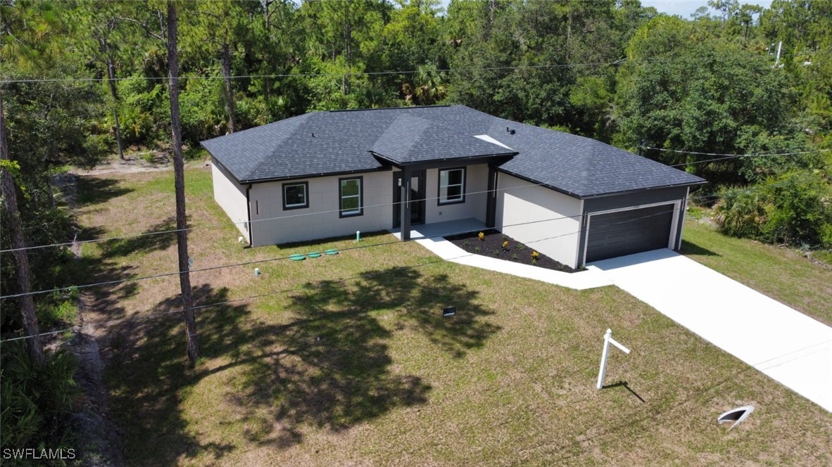 4204 East 24th Street Alva, FL 33920 - Photo 6 of 34 a view of a house with a yard