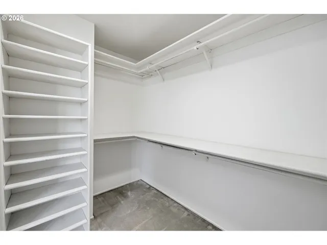 a view of an empty walk in closet