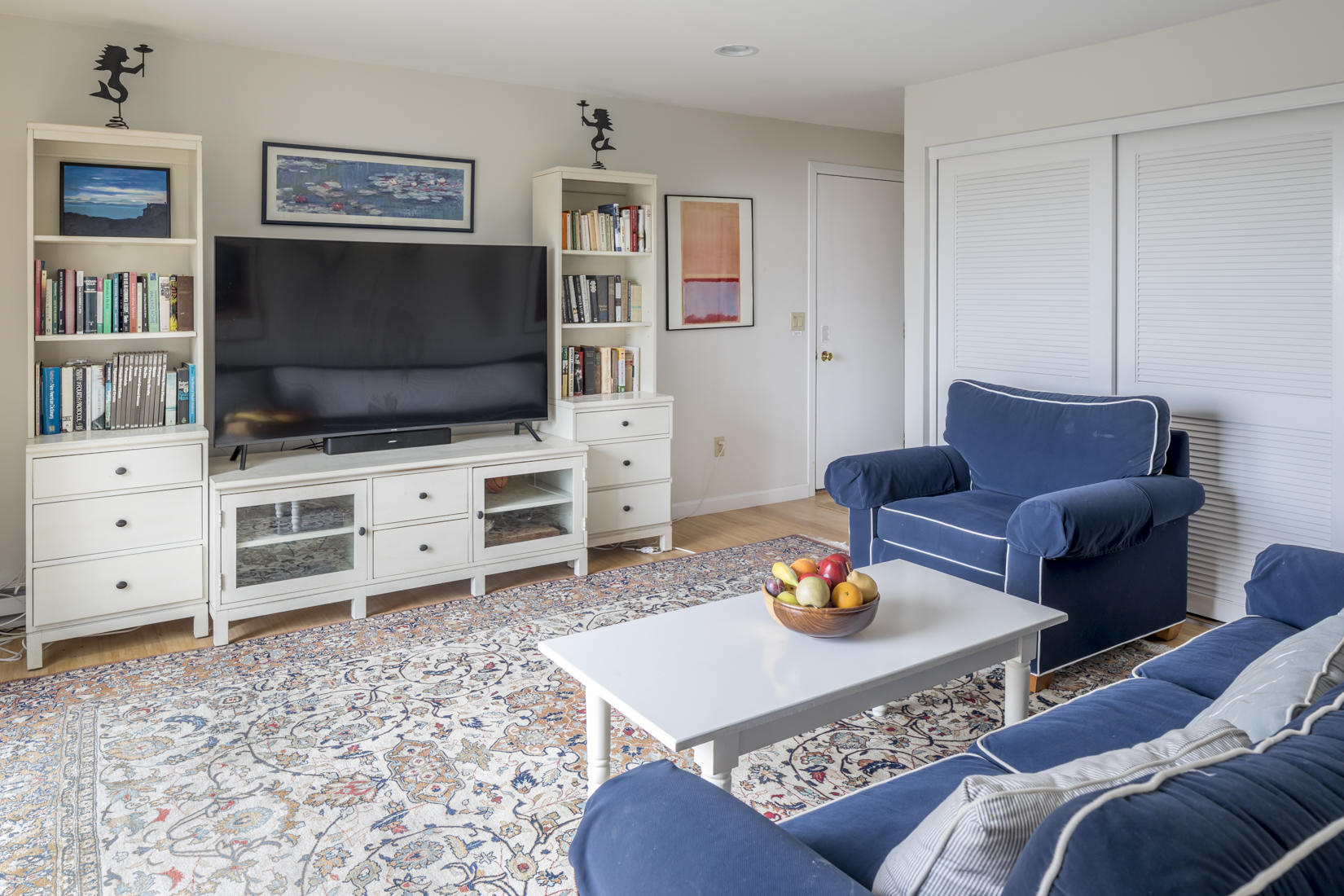 3 High Ridge Road Truro, MA 02666 - Photo 27 of 43 a living room with furniture and a flat screen tv