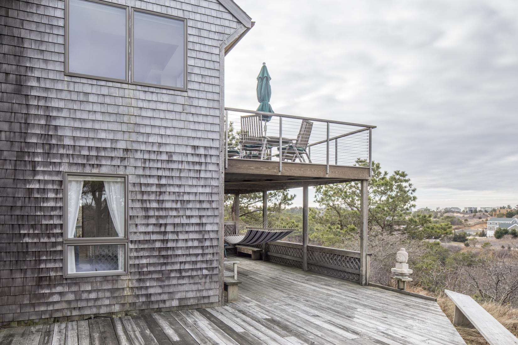 3 High Ridge Road Truro, MA 02666 - Photo 29 of 43 a view of a house with a balcony