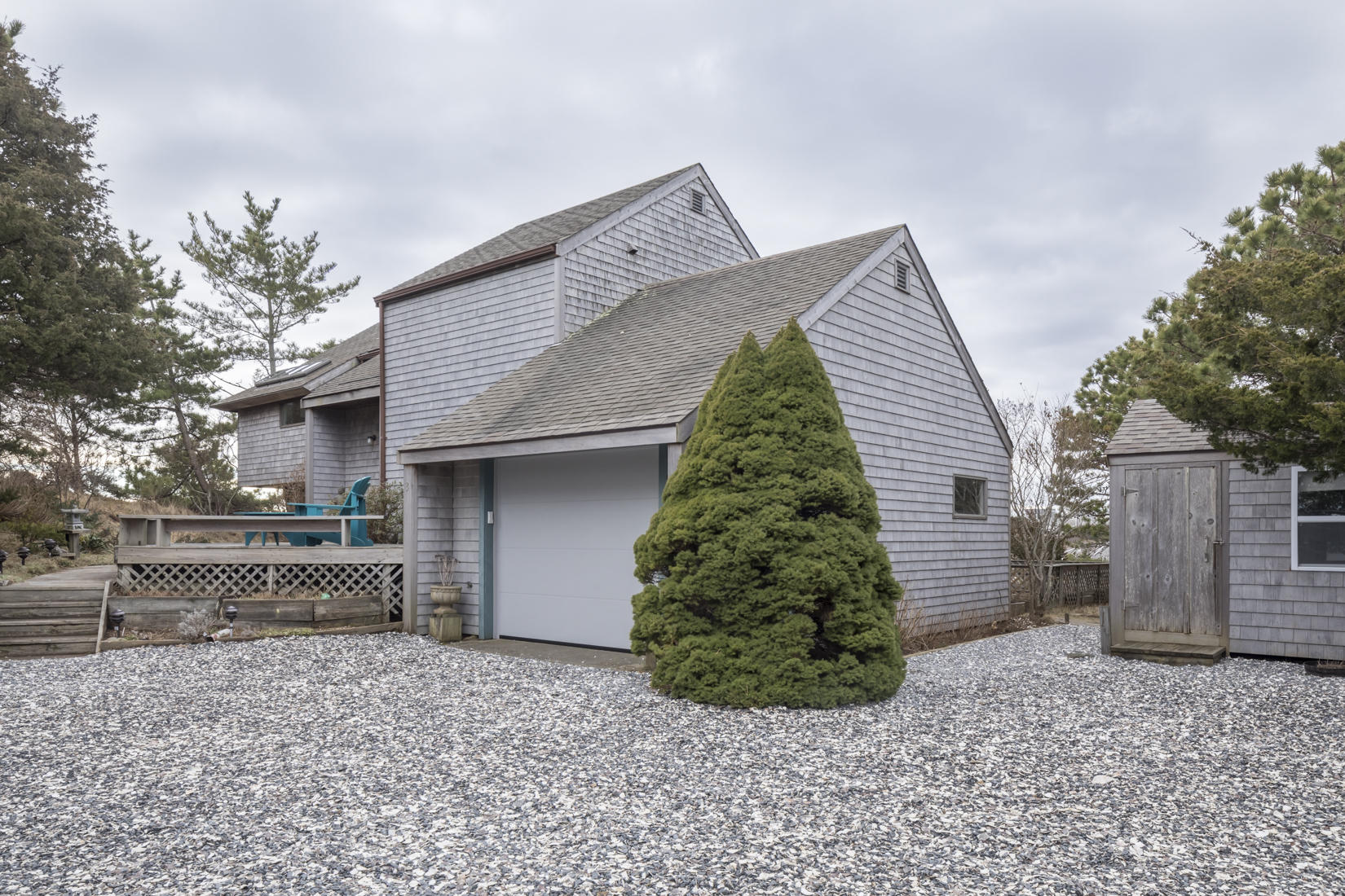 3 High Ridge Road Truro, MA 02666 - Photo 3 of 43 a front view of a house with a yard