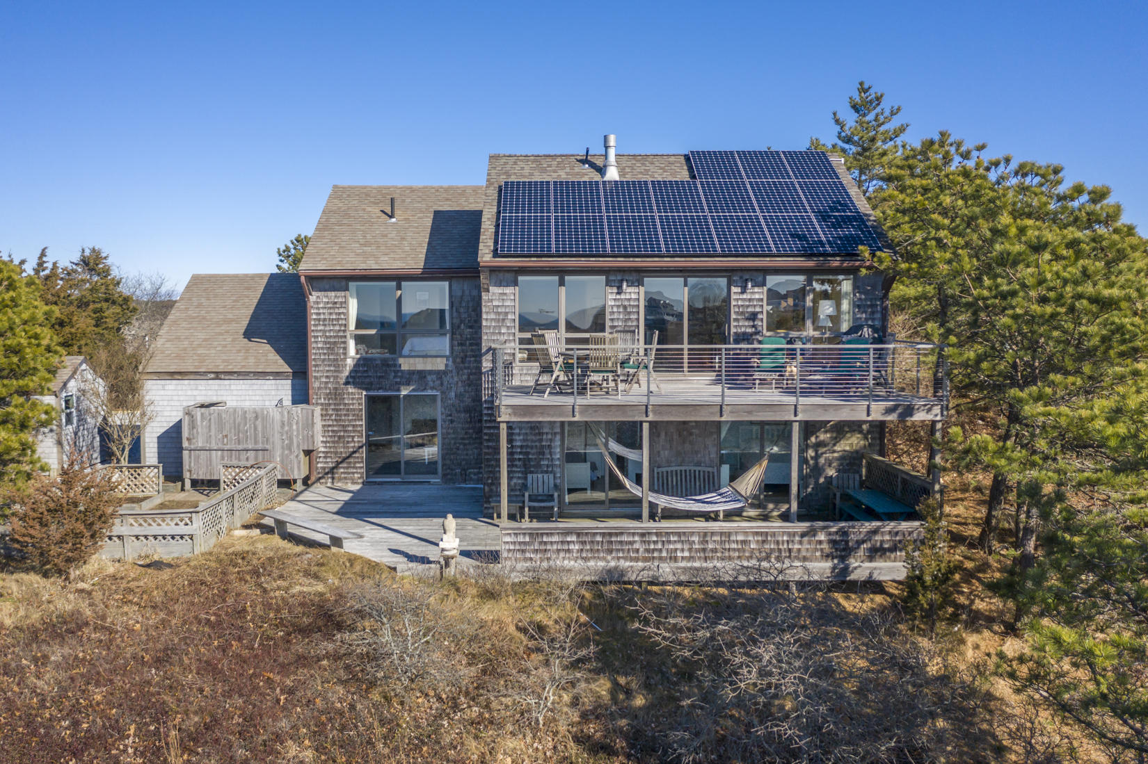 3 High Ridge Road Truro, MA 02666 - Photo 33 of 43 a front view of a house with a yard