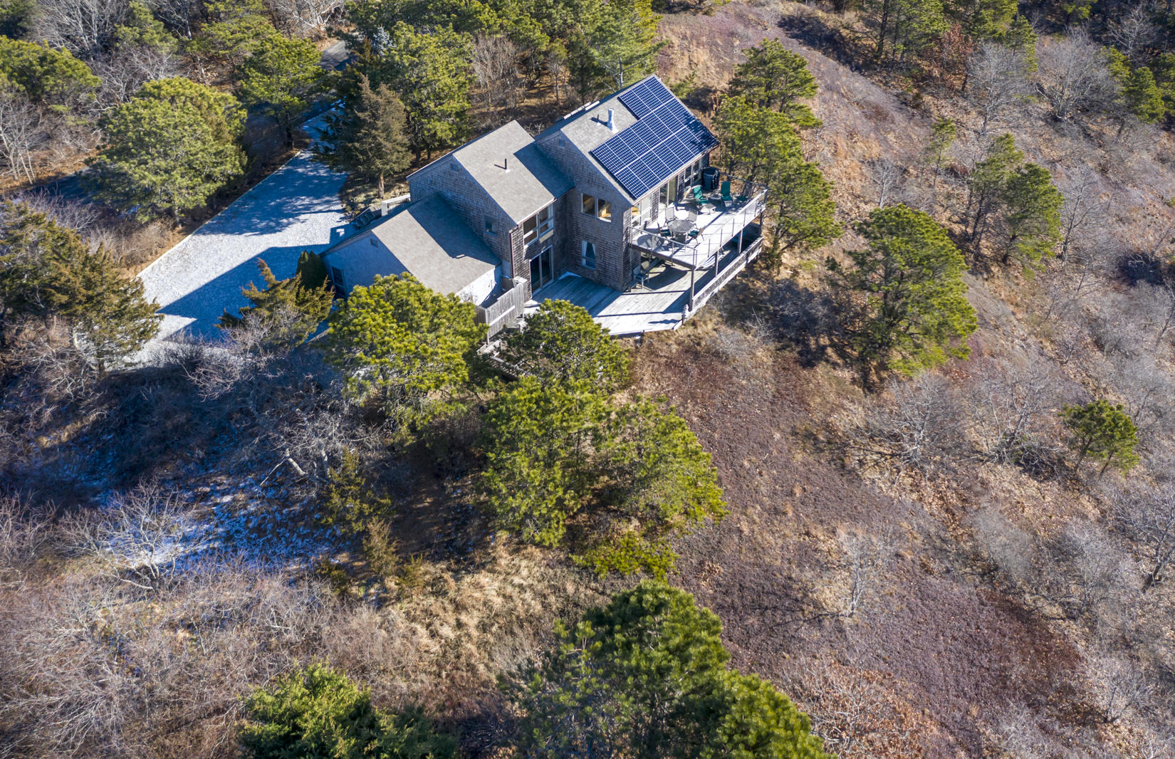 3 High Ridge Road Truro, MA 02666 - Photo 36 of 43 a view of a house with a yard and a forest