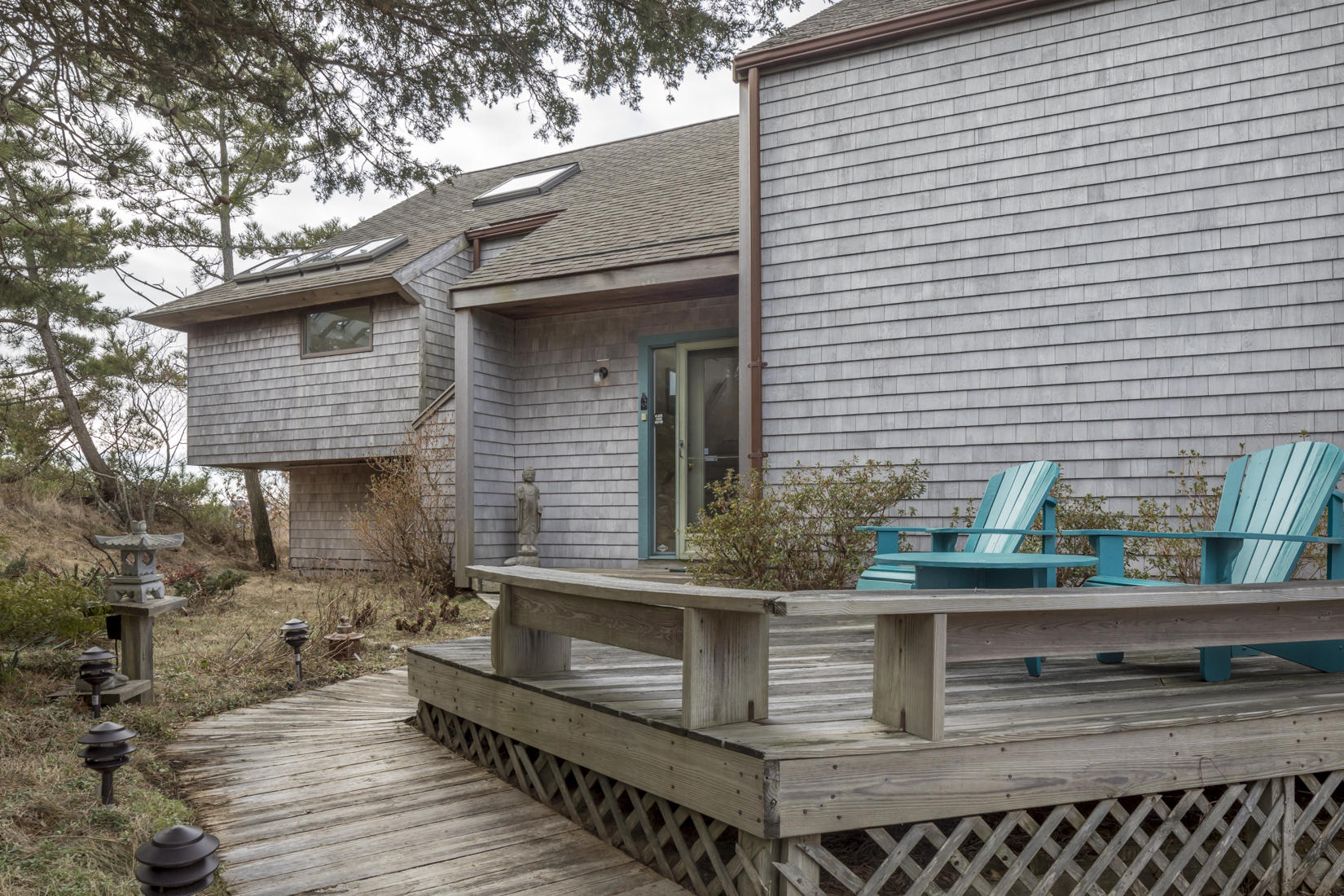 3 High Ridge Road Truro, MA 02666 - Photo 4 of 43 a view of house with outdoor seating