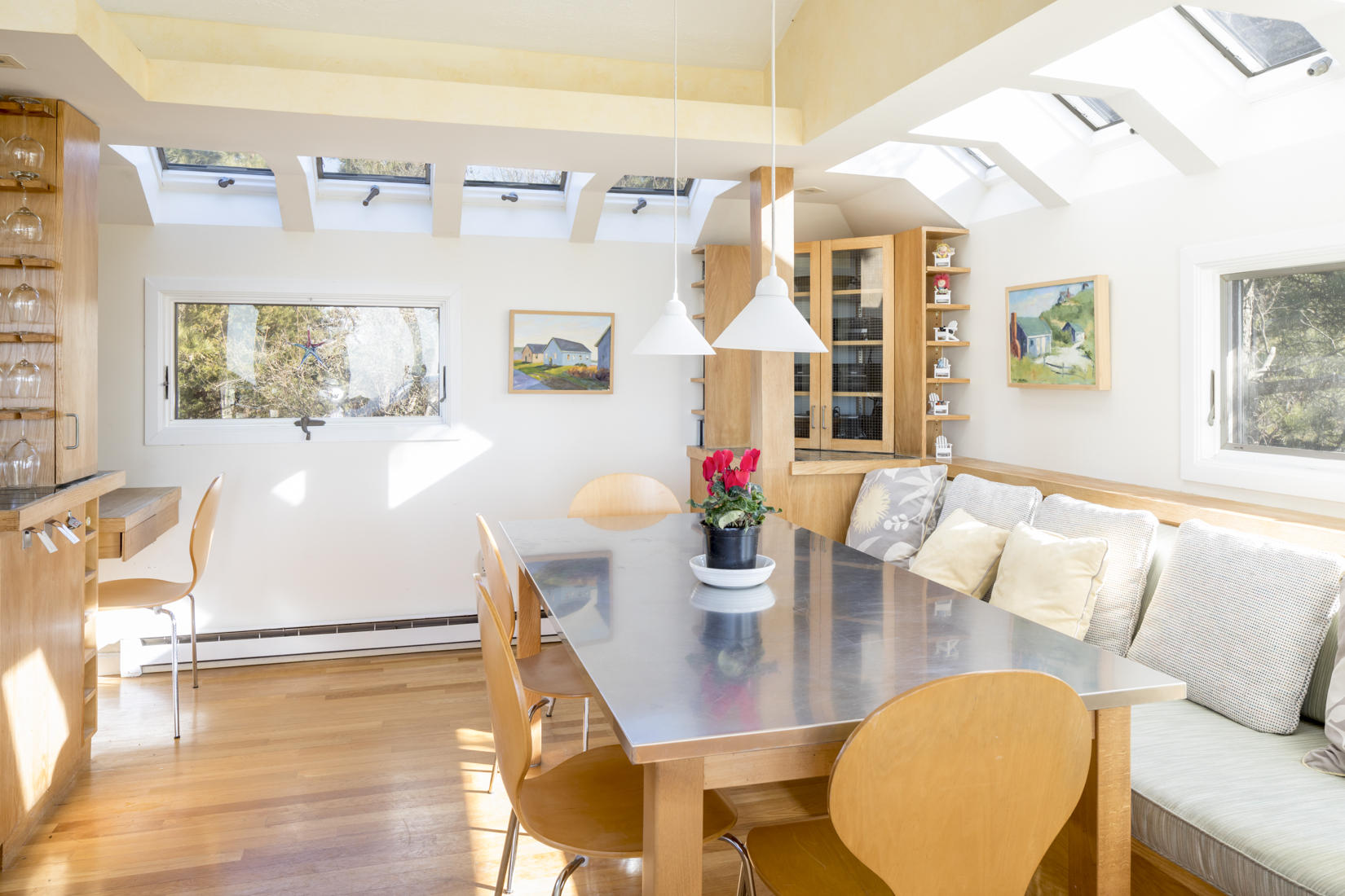 3 High Ridge Road Truro, MA 02666 - Photo 9 of 43 a living room with dining room and wooden floor