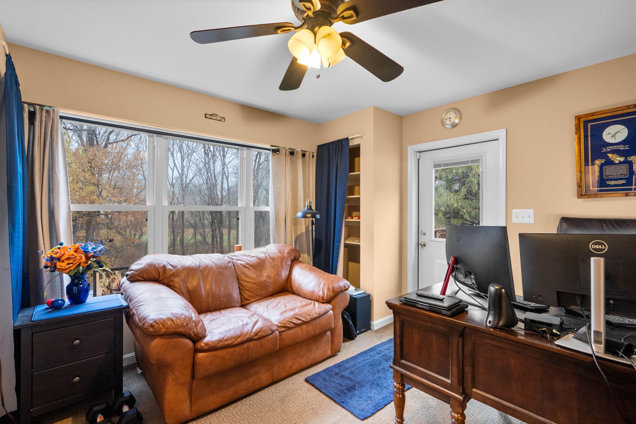 13100 Croom Road Upper Marlboro, MD 20772 - Photo 19 of 34 a living room with furniture and a window