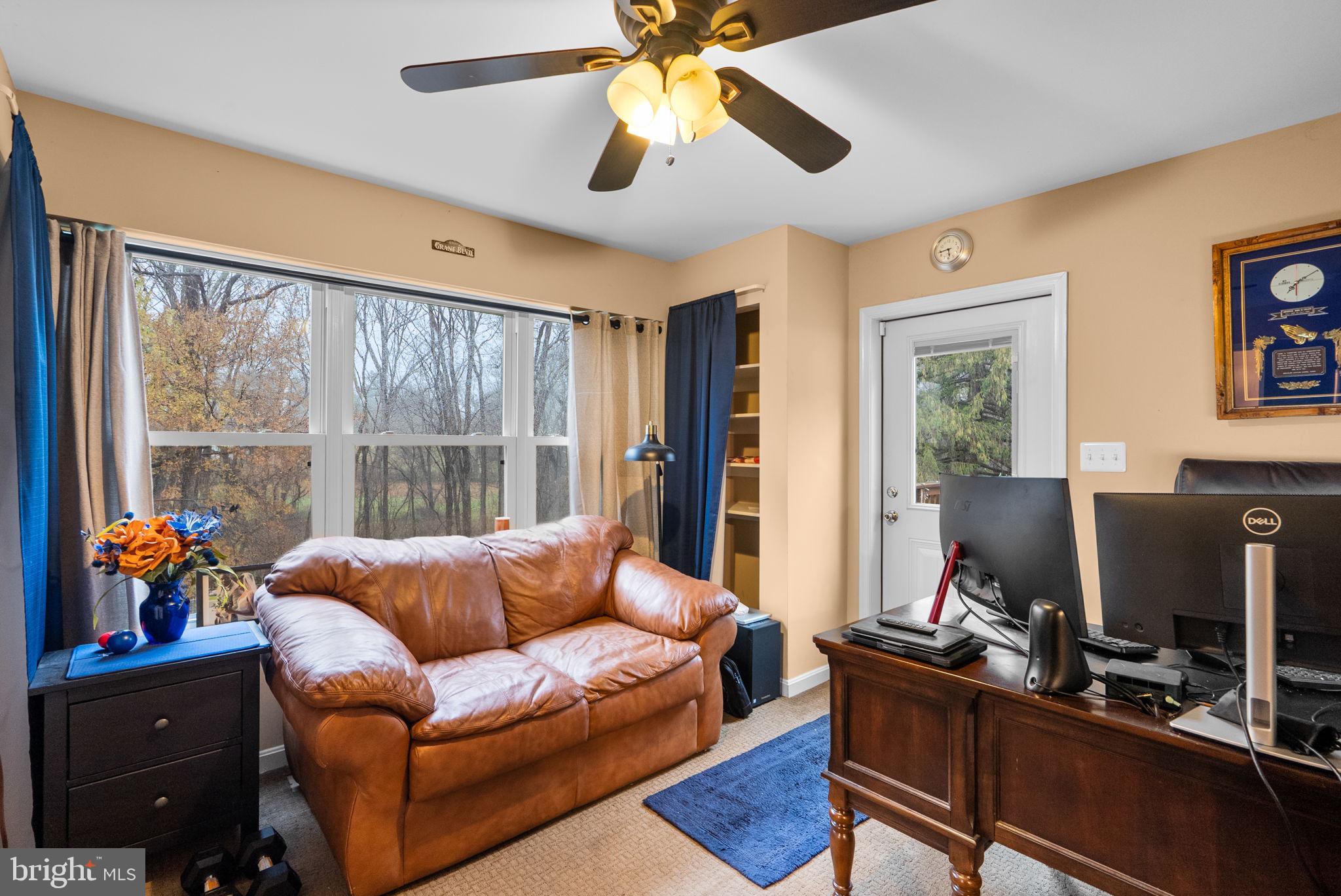 13100 Croom Road Upper Marlboro, MD 20772 - Photo 19 of 37 a living room with furniture and a window