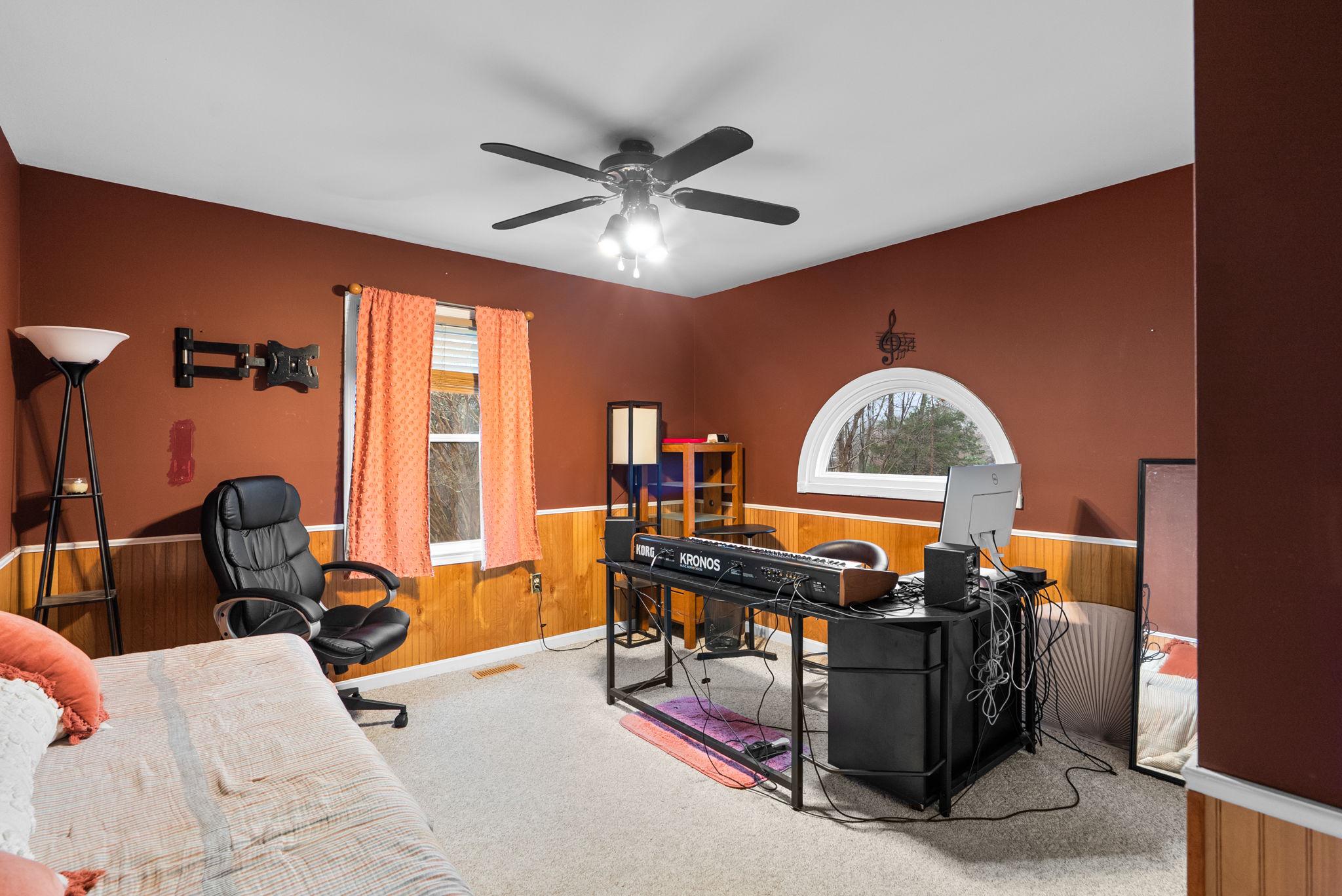 13100 Croom Road Upper Marlboro, MD 20772 - Photo 24 of 34 a view of a workspace with furniture and a window