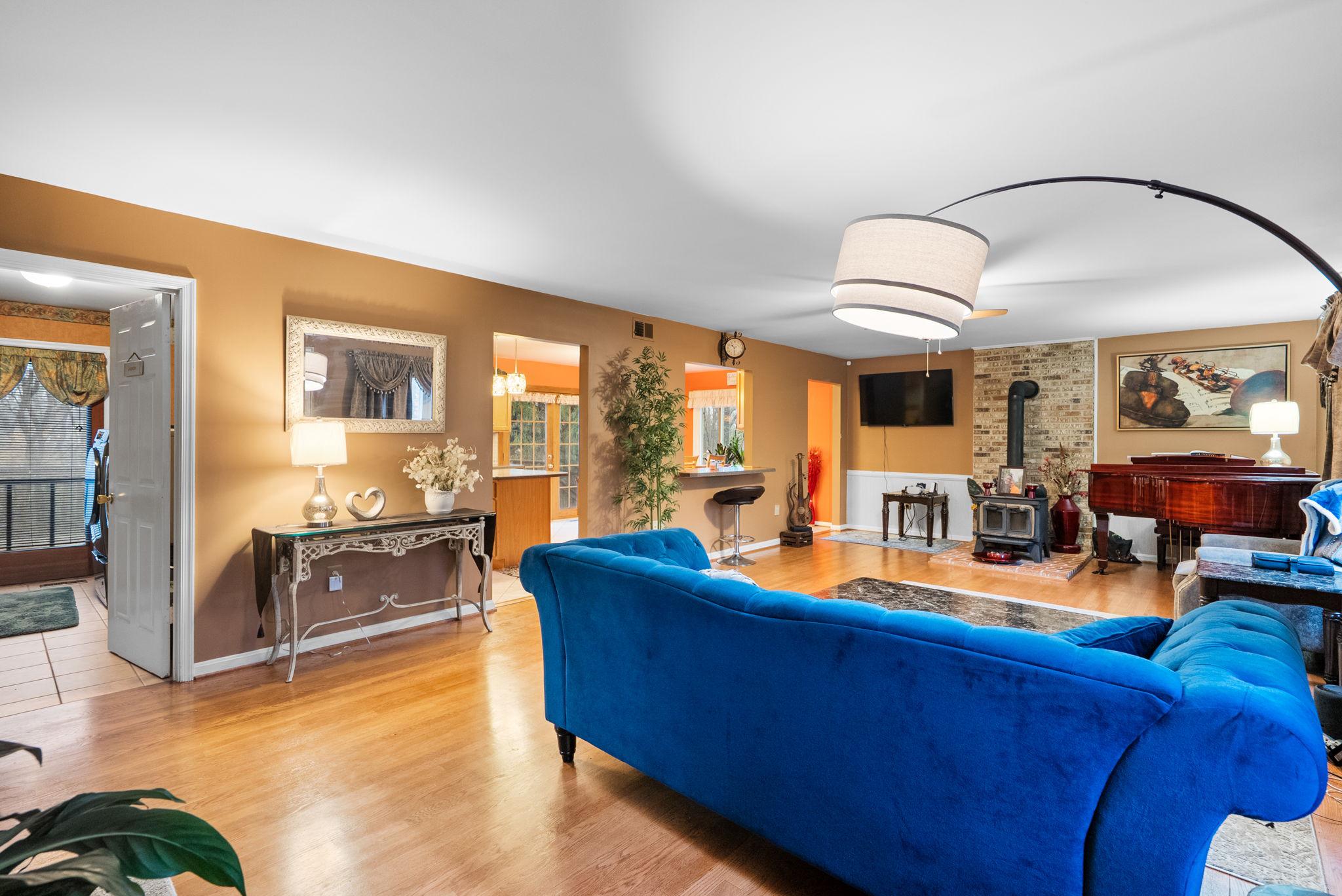 13100 Croom Road Upper Marlboro, MD 20772 - Photo 3 of 34 a living room with furniture and a large window