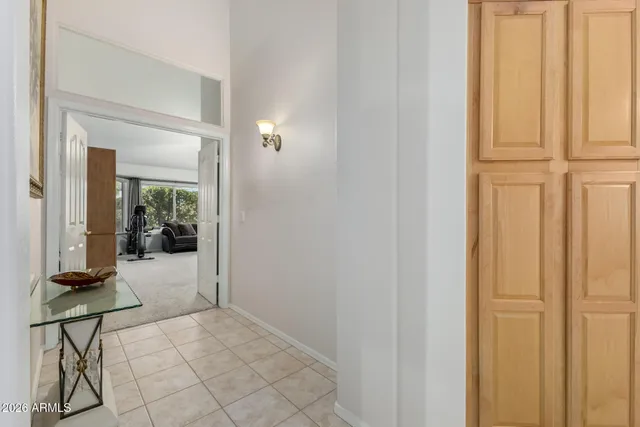 a view of a livingroom with table and chair