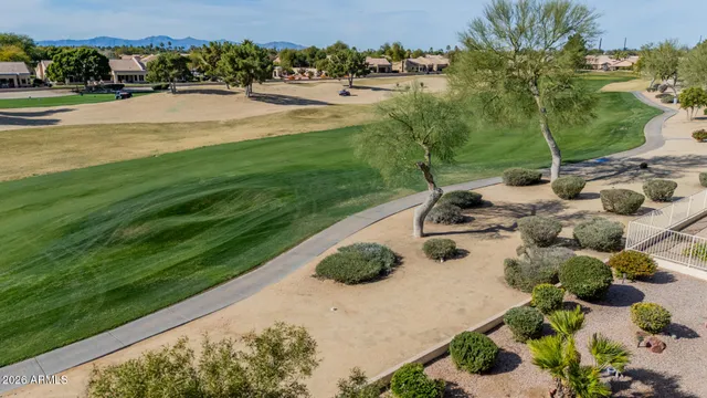 a view of a backyard of the house