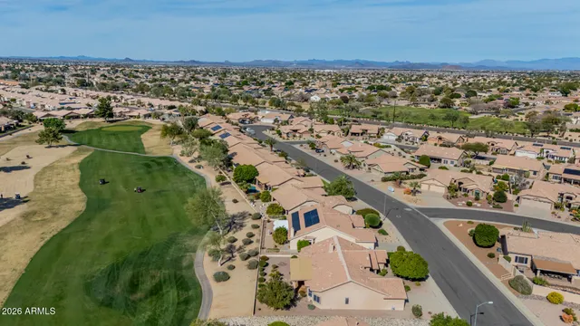 an aerial view of a house with a outdoor space