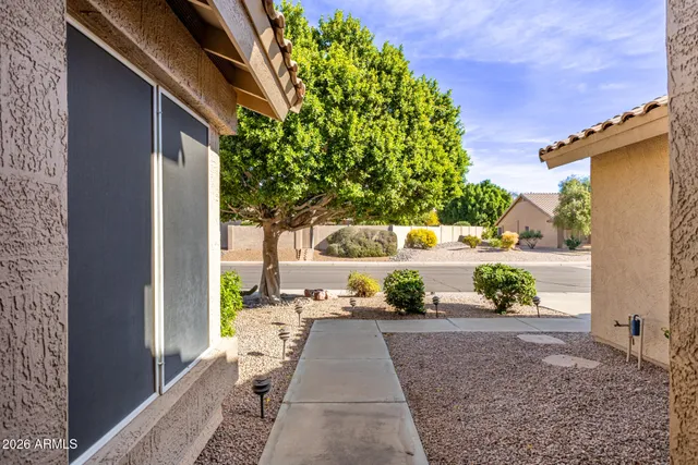 a view of a back yard of the house