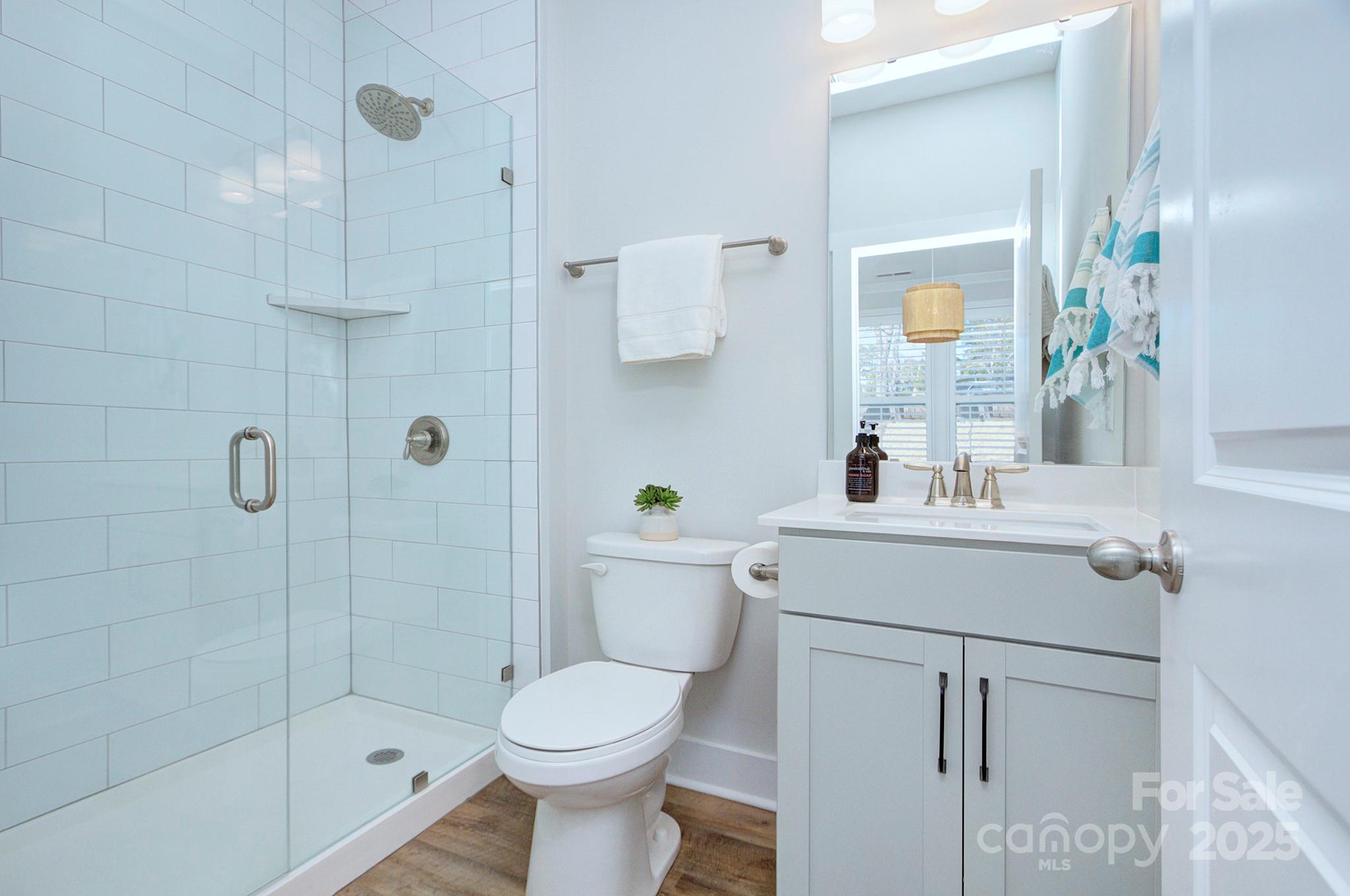 1176 Weir Court Fort Mill, SC 29708 - Photo 17 of 35 a bathroom with a sink toilet and shower
