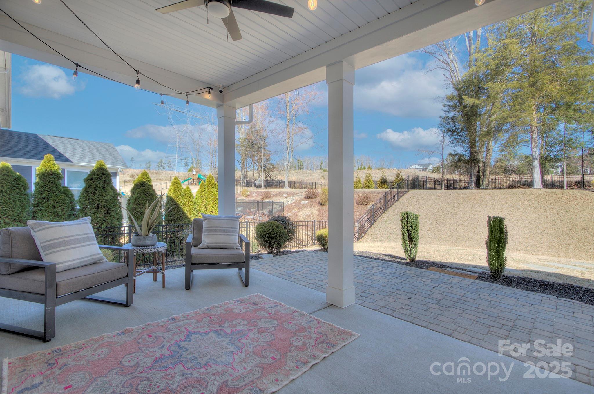 1176 Weir Court Fort Mill, SC 29708 - Photo 25 of 35 a building outdoor space with patio furniture and a potted plant