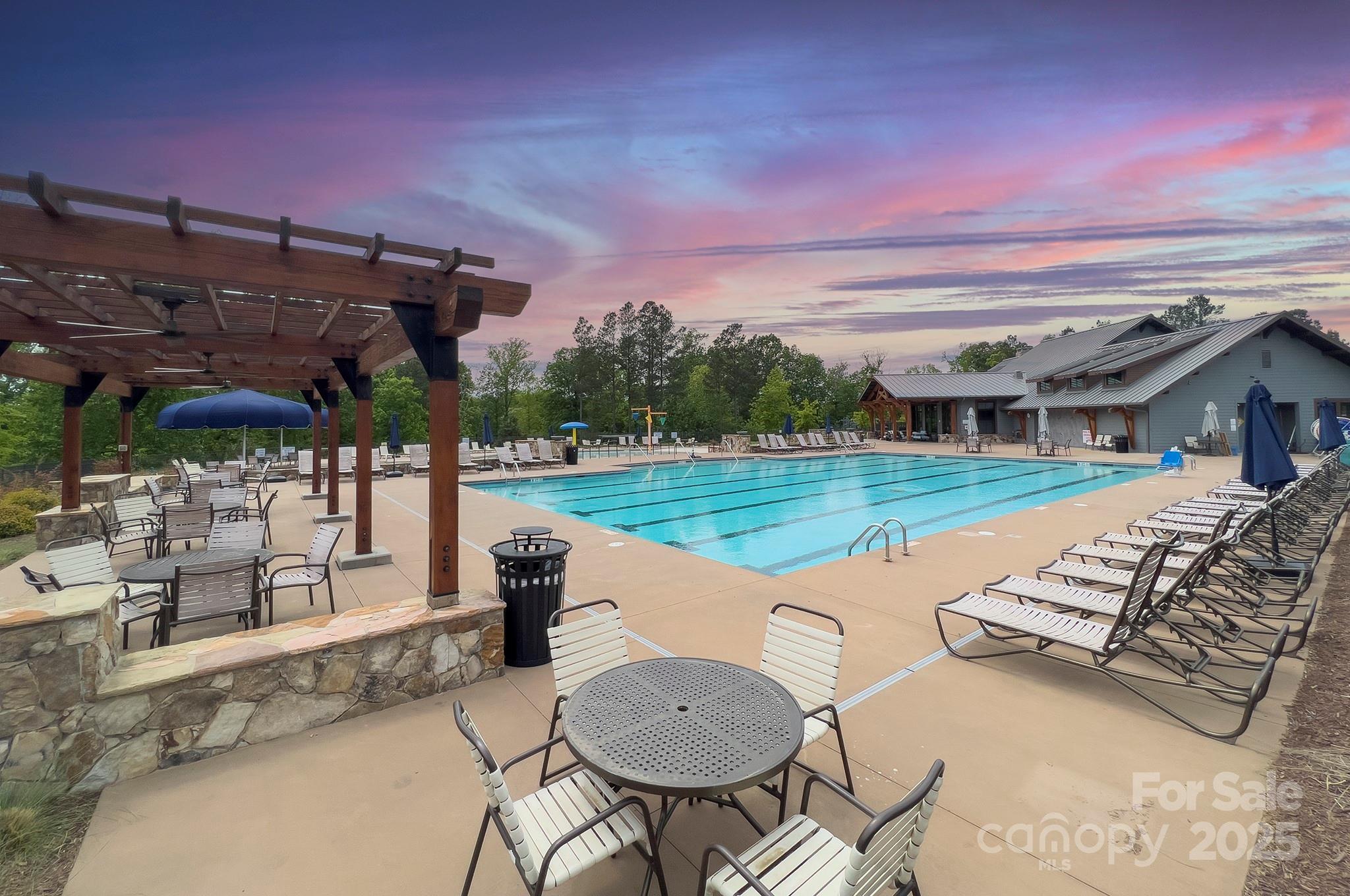 1176 Weir Court Fort Mill, SC 29708 - Photo 31 of 35 a view of a swimming pool with a patio