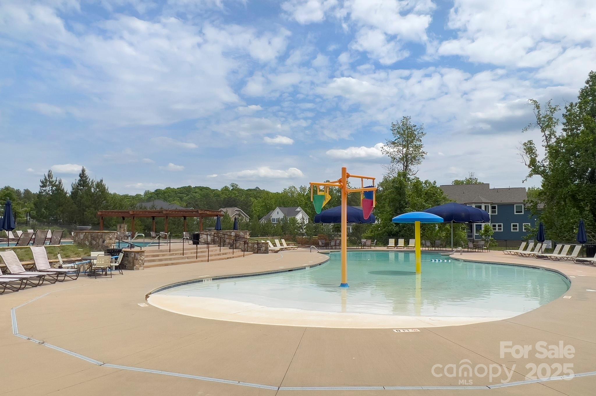 1176 Weir Court Fort Mill, SC 29708 - Photo 32 of 35 a view of a swimming pool with outdoor seating