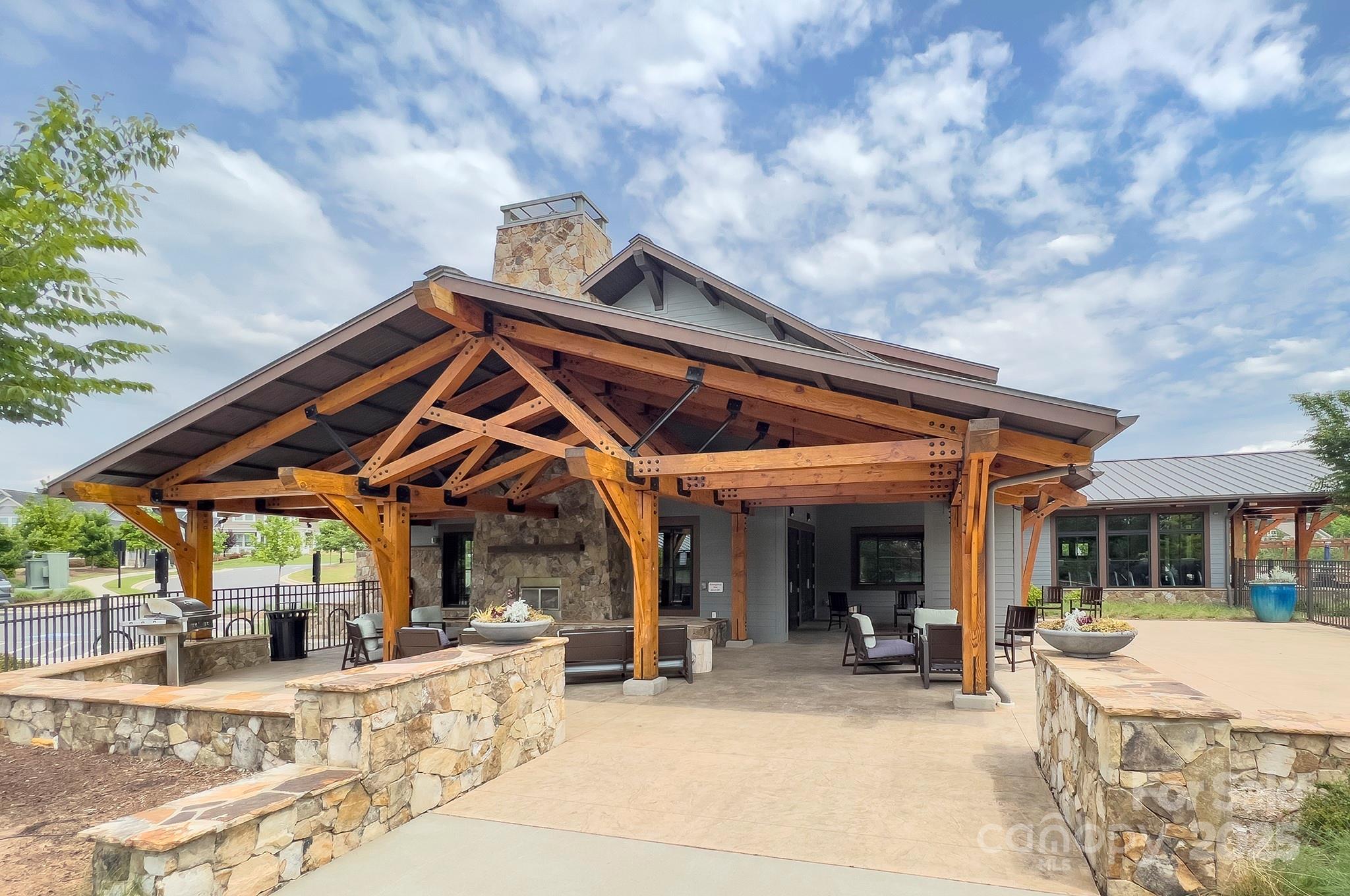 1176 Weir Court Fort Mill, SC 29708 - Photo 34 of 35 a view of a house with backyard porch and sitting area