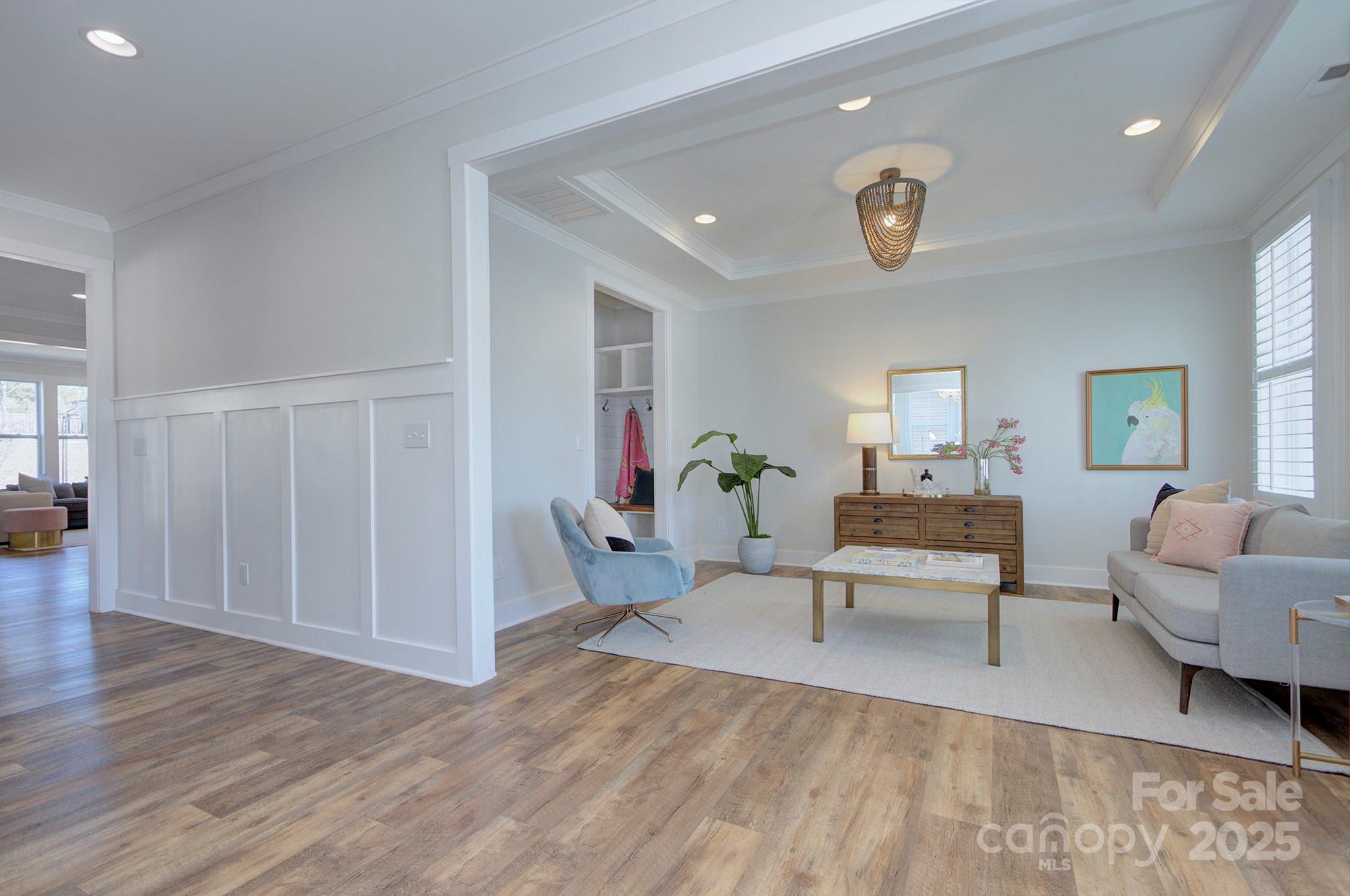 1176 Weir Court Fort Mill, SC 29708 - Photo 6 of 35 a living room with furniture and wooden floor
