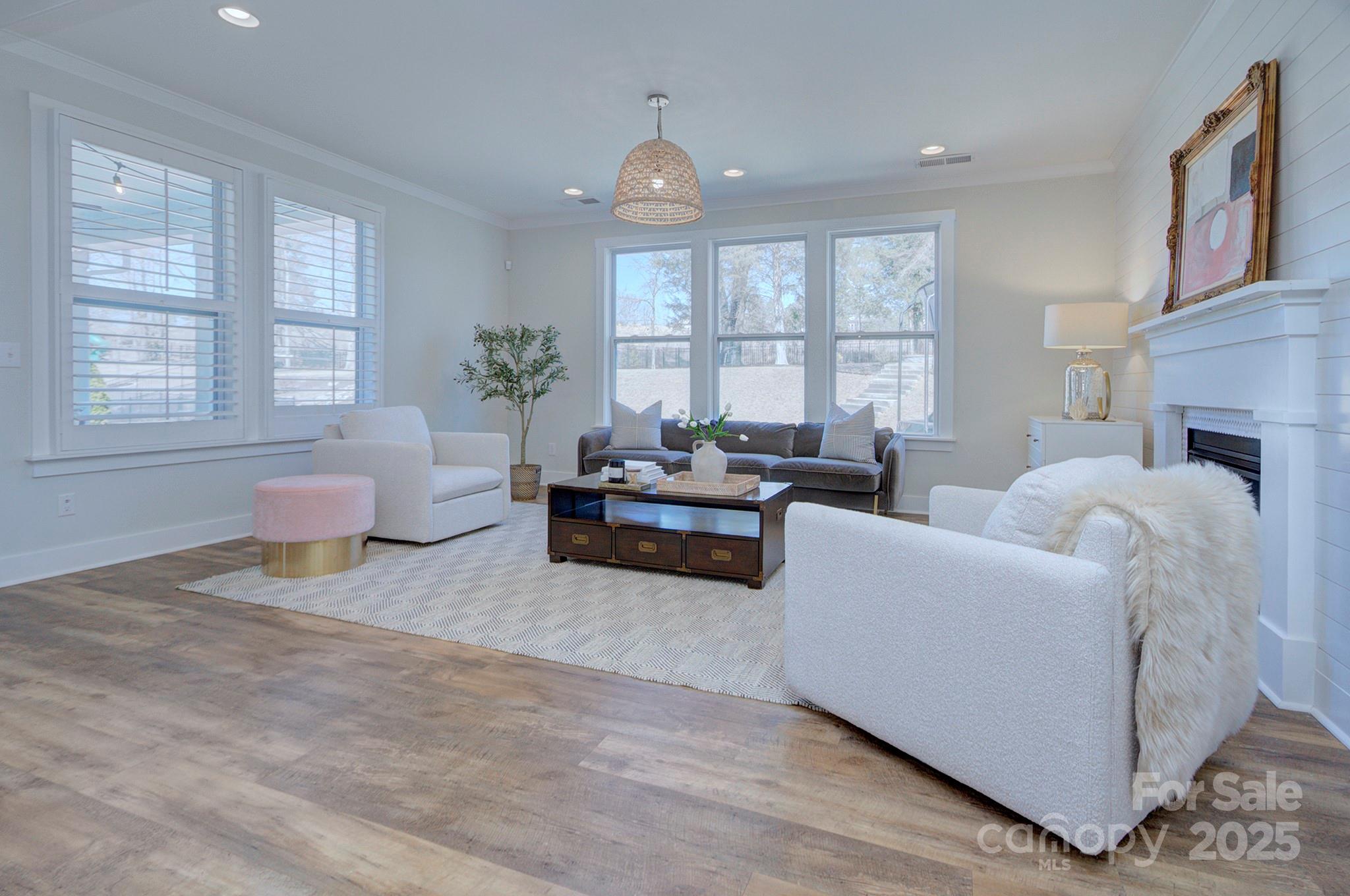 1176 Weir Court Fort Mill, SC 29708 - Photo 10 of 35 a living room with furniture and a large window
