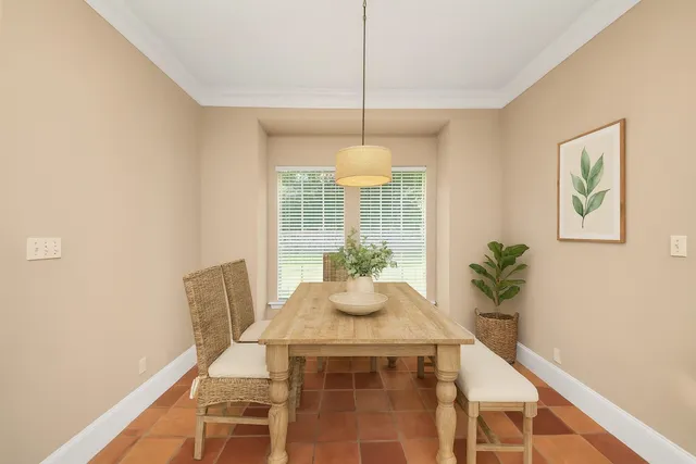 a spacious bathroom with a granite countertop sink and a mirror