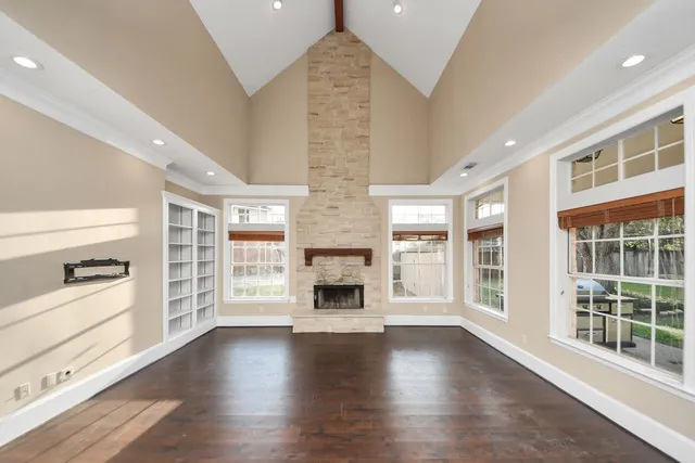an aerial view of a house with a garden