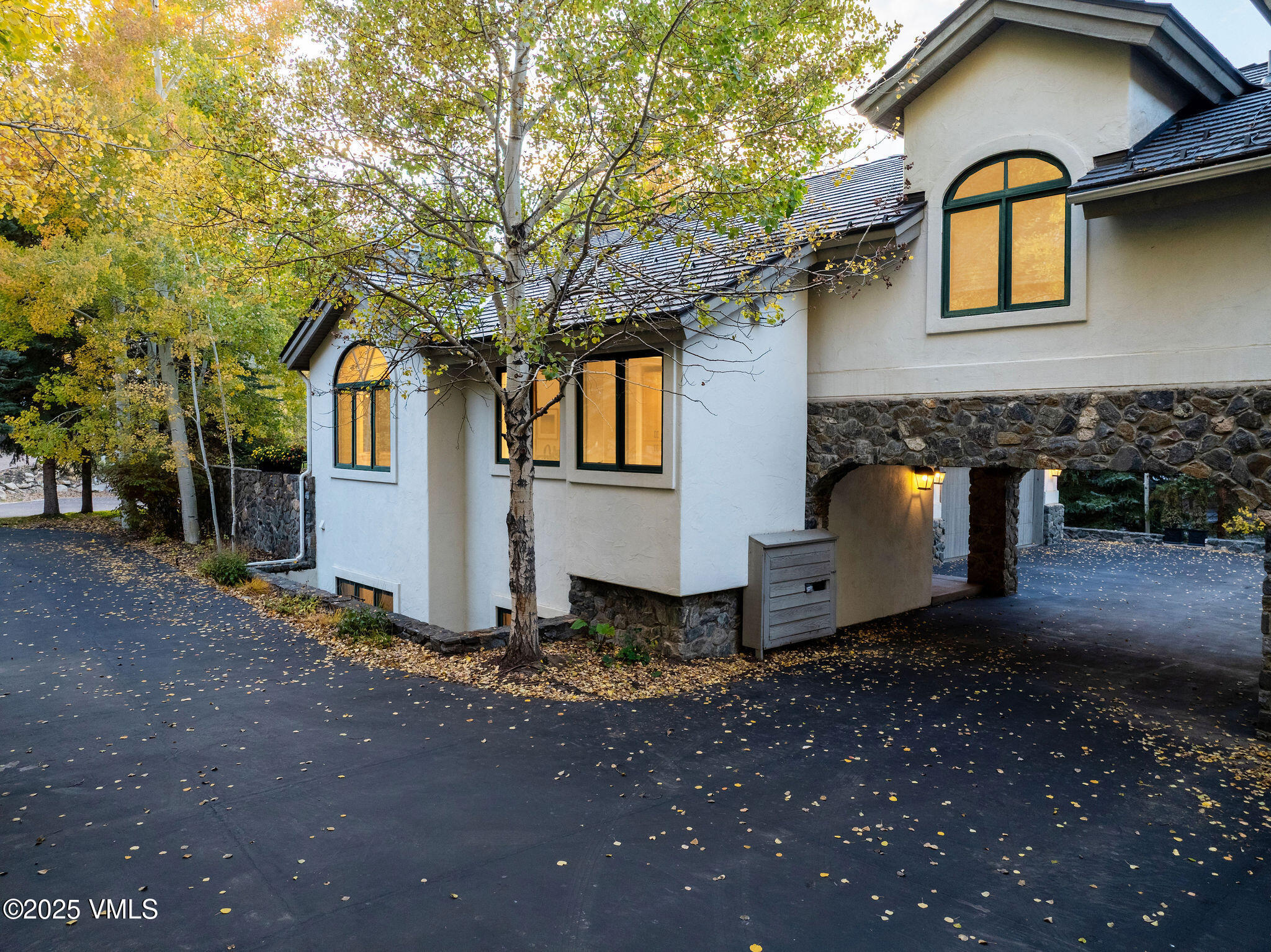 230 Castle Peak Gate, Unit B Edwards, CO 81632 - Photo 12 of 12 a front view of a house with a yard