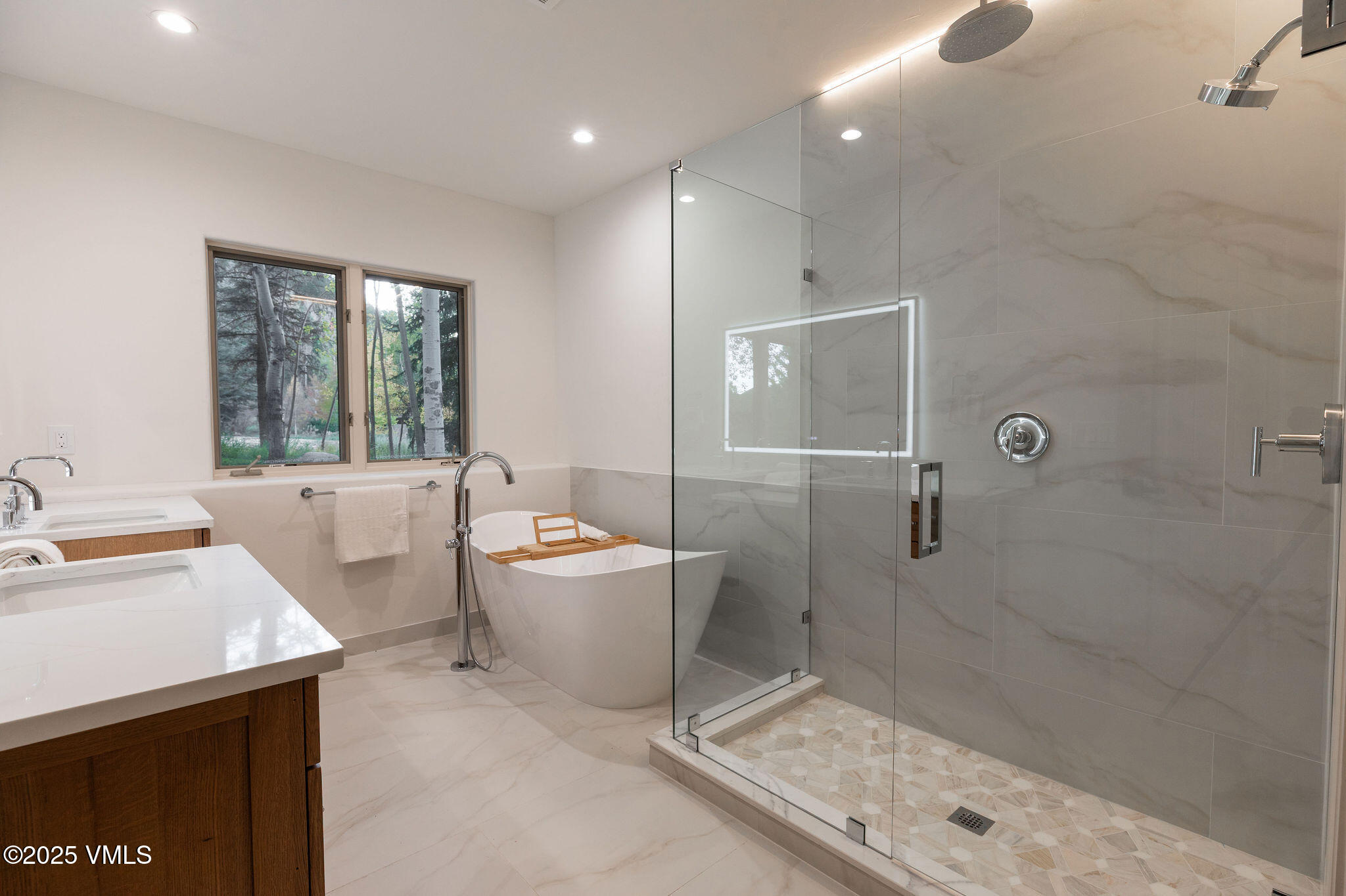 230 Castle Peak Gate, Unit B Edwards, CO 81632 - Photo 9 of 12 a bathroom with a sink a toilet and shower