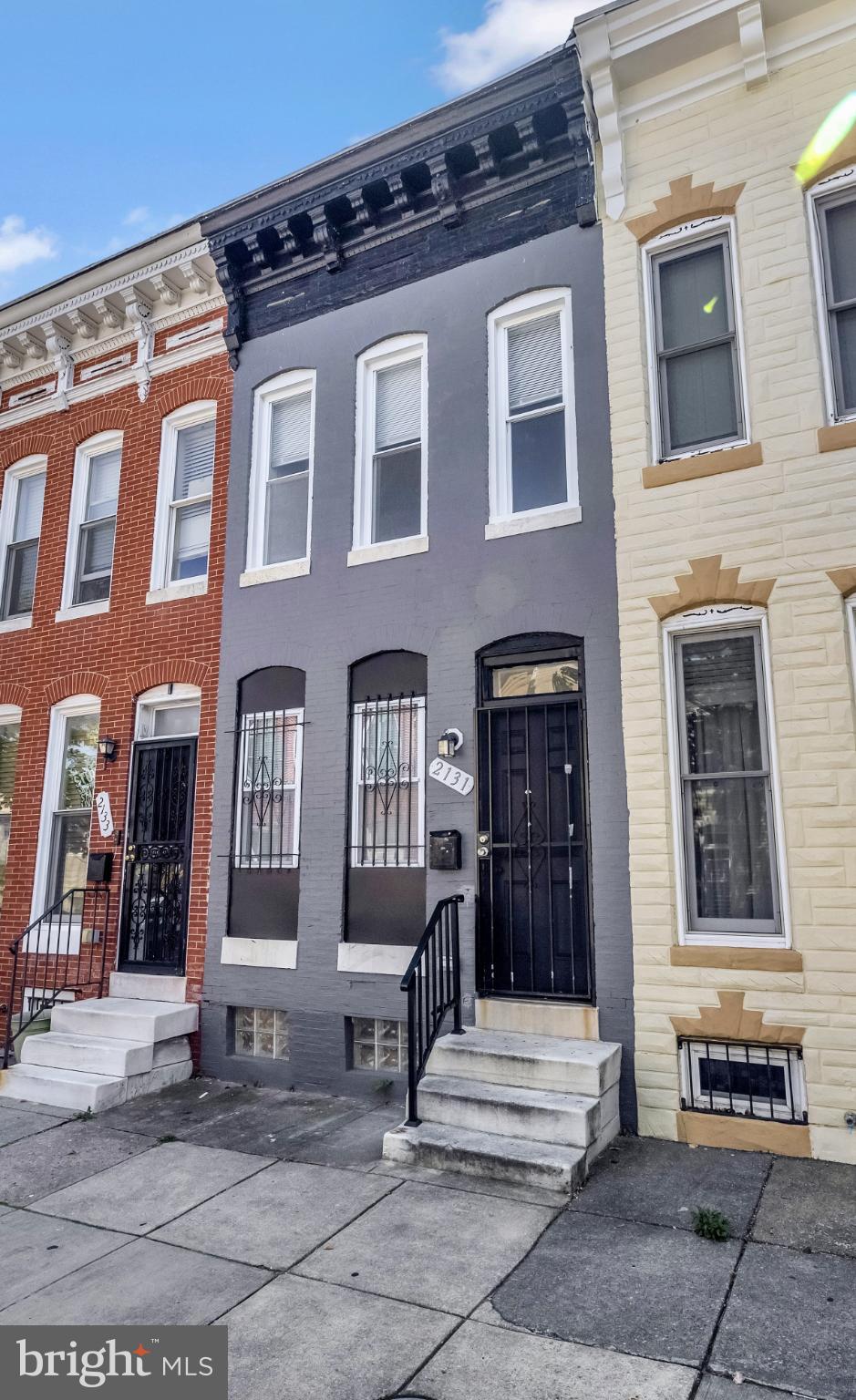 2131 Jefferson Street Baltimore, MD 21205 - Photo 2 of 24 a building with glass door