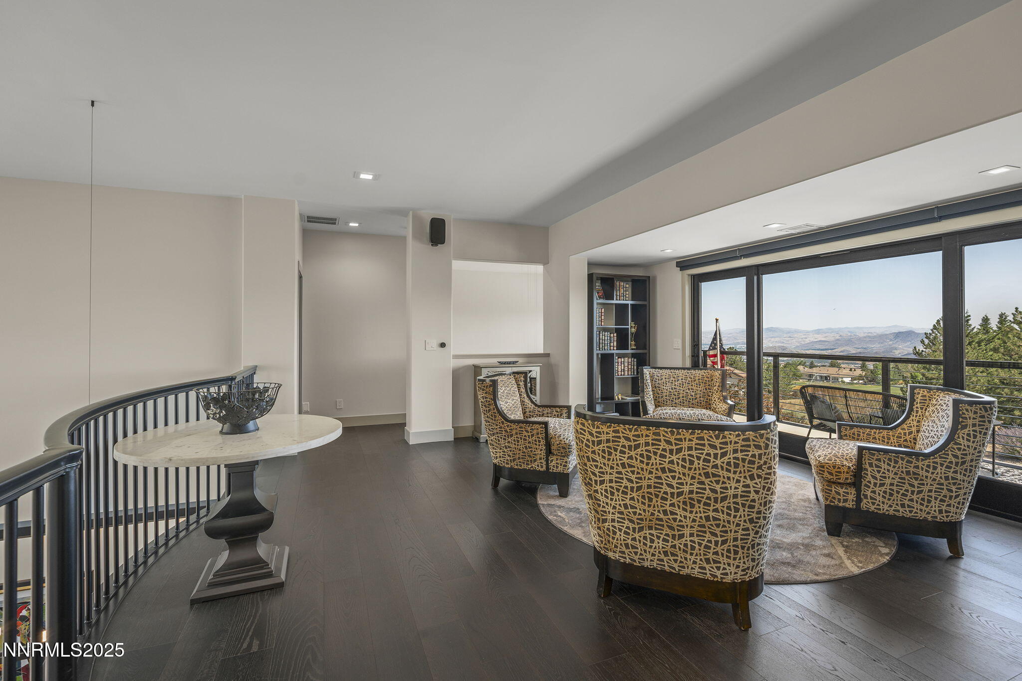 6177 North Featherstone Circle Reno, NV 89511 - Photo 35 of 72 a living room with furniture and a large window