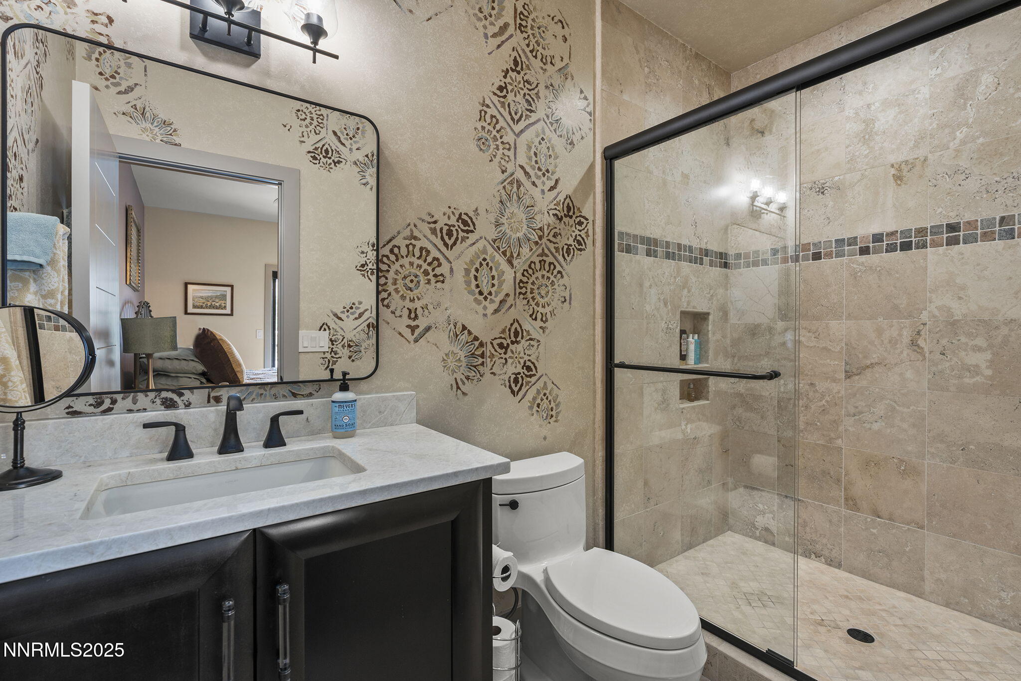 6177 North Featherstone Circle Reno, NV 89511 - Photo 38 of 72 a bathroom with a sink a toilet and shower