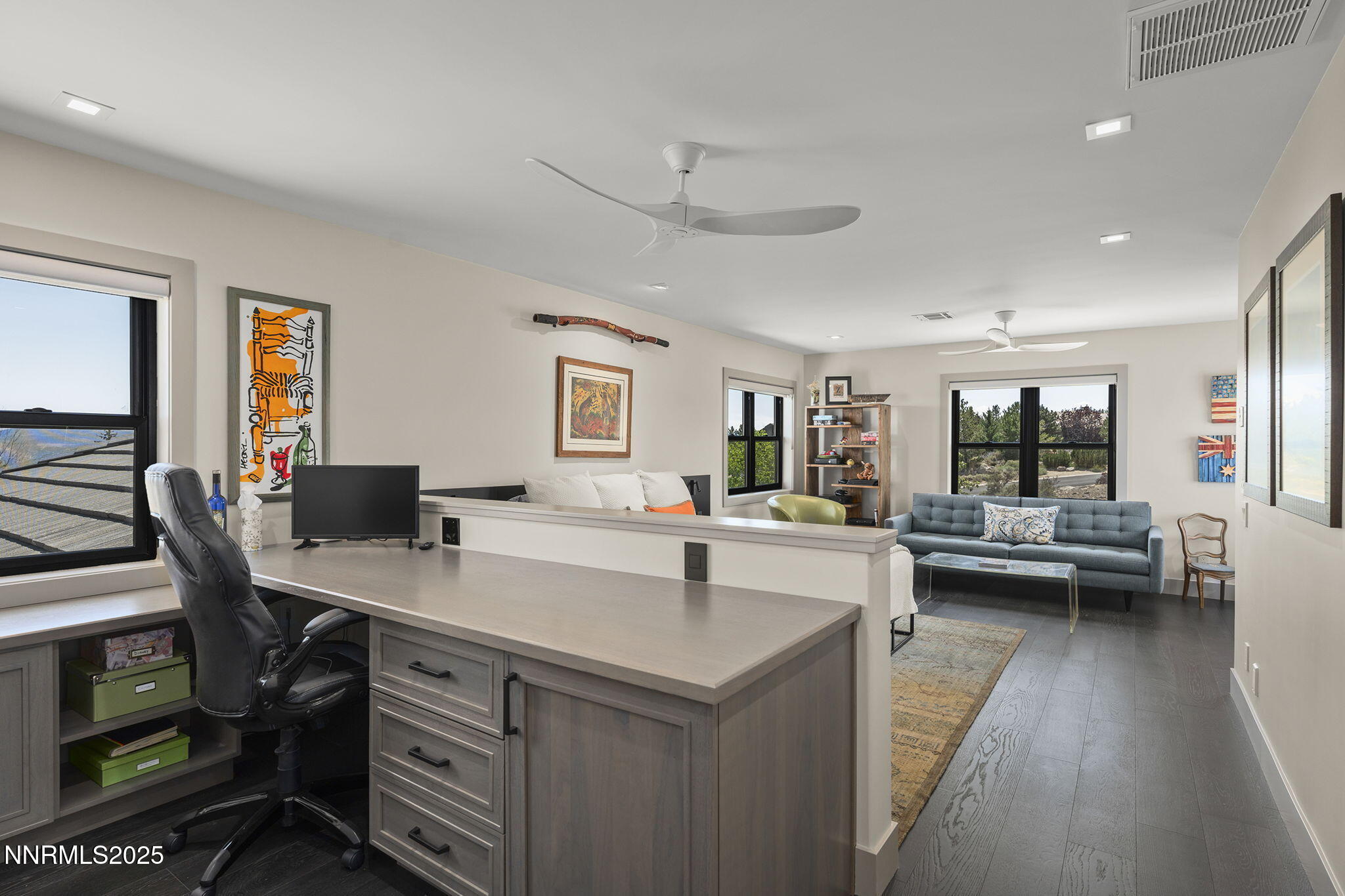 6177 North Featherstone Circle Reno, NV 89511 - Photo 44 of 72 a view of a kitchen with kitchen island a dining table and chairs