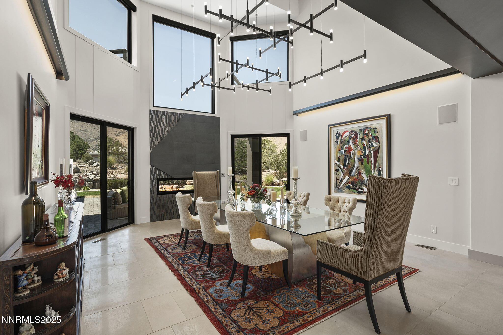 6177 North Featherstone Circle Reno, NV 89511 - Photo 5 of 72 a view of a dining room with furniture window and wooden floor