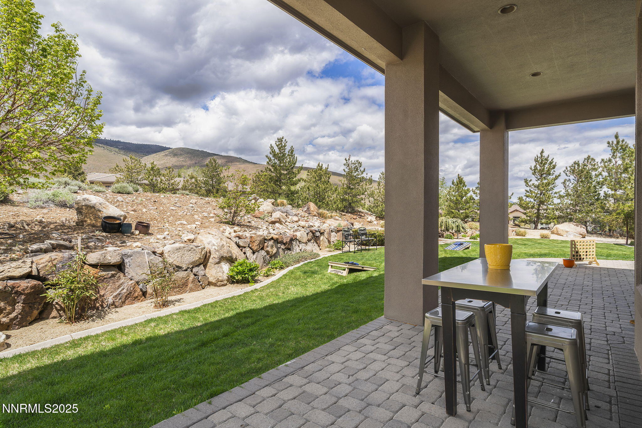 6177 North Featherstone Circle Reno, NV 89511 - Photo 64 of 72 a view of a porch with furniture and garden