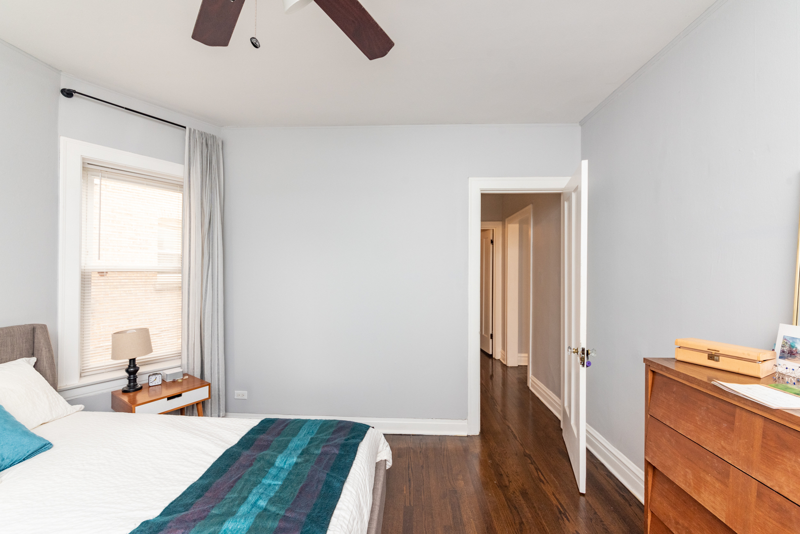 4014 West Nelson Street, Unit 1 Chicago, IL 60641 - Photo 11 of 21 a bed room with a bed and a window