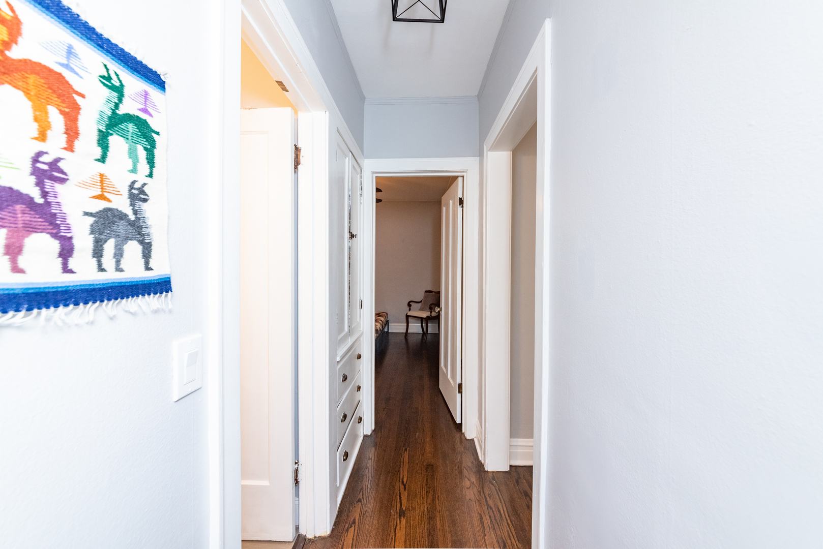 4014 West Nelson Street, Unit 1 Chicago, IL 60641 - Photo 13 of 21 a view of a hallway with wooden floor and staircase