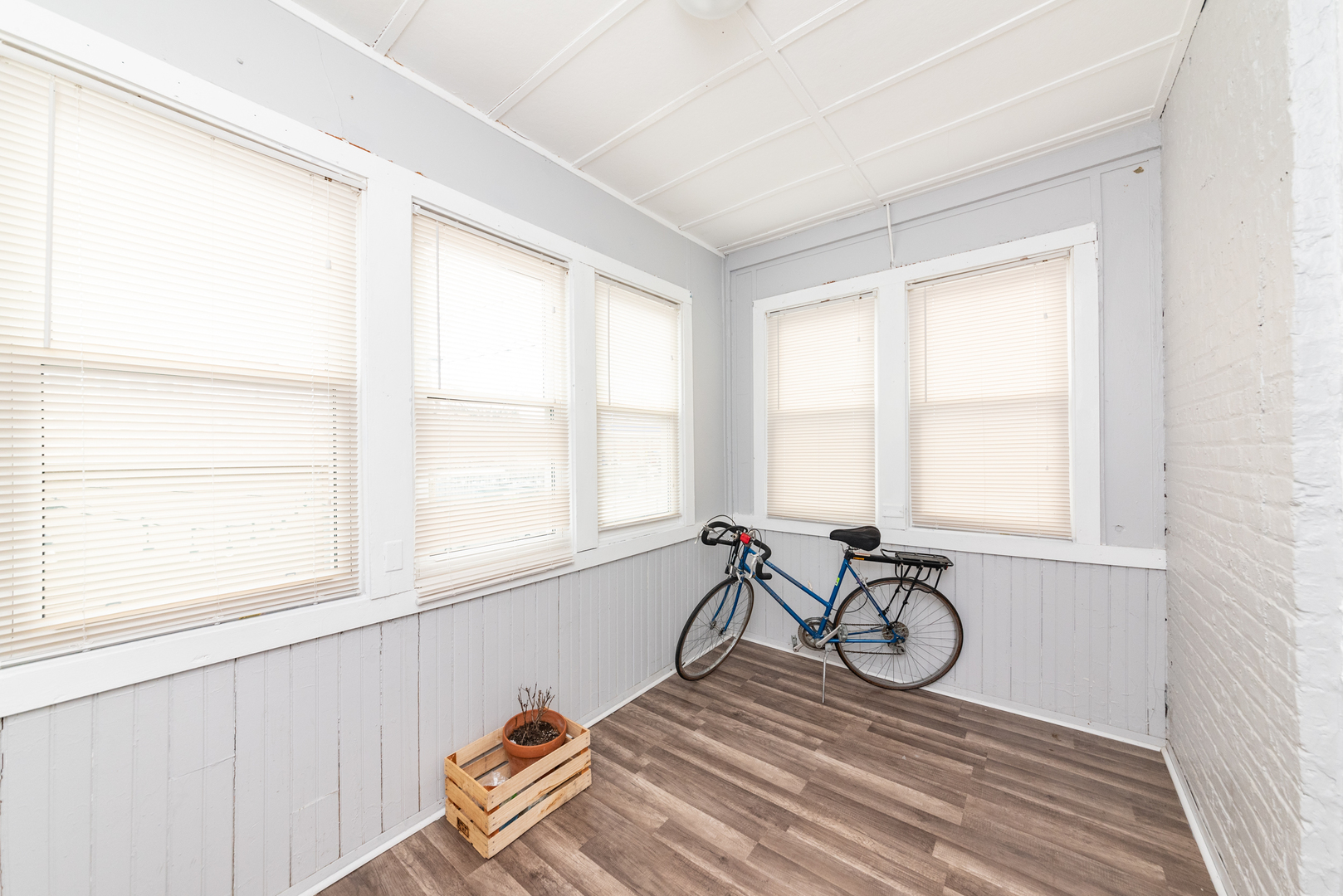 4014 West Nelson Street, Unit 1 Chicago, IL 60641 - Photo 19 of 21 a view of a livingroom with wooden floor and a window