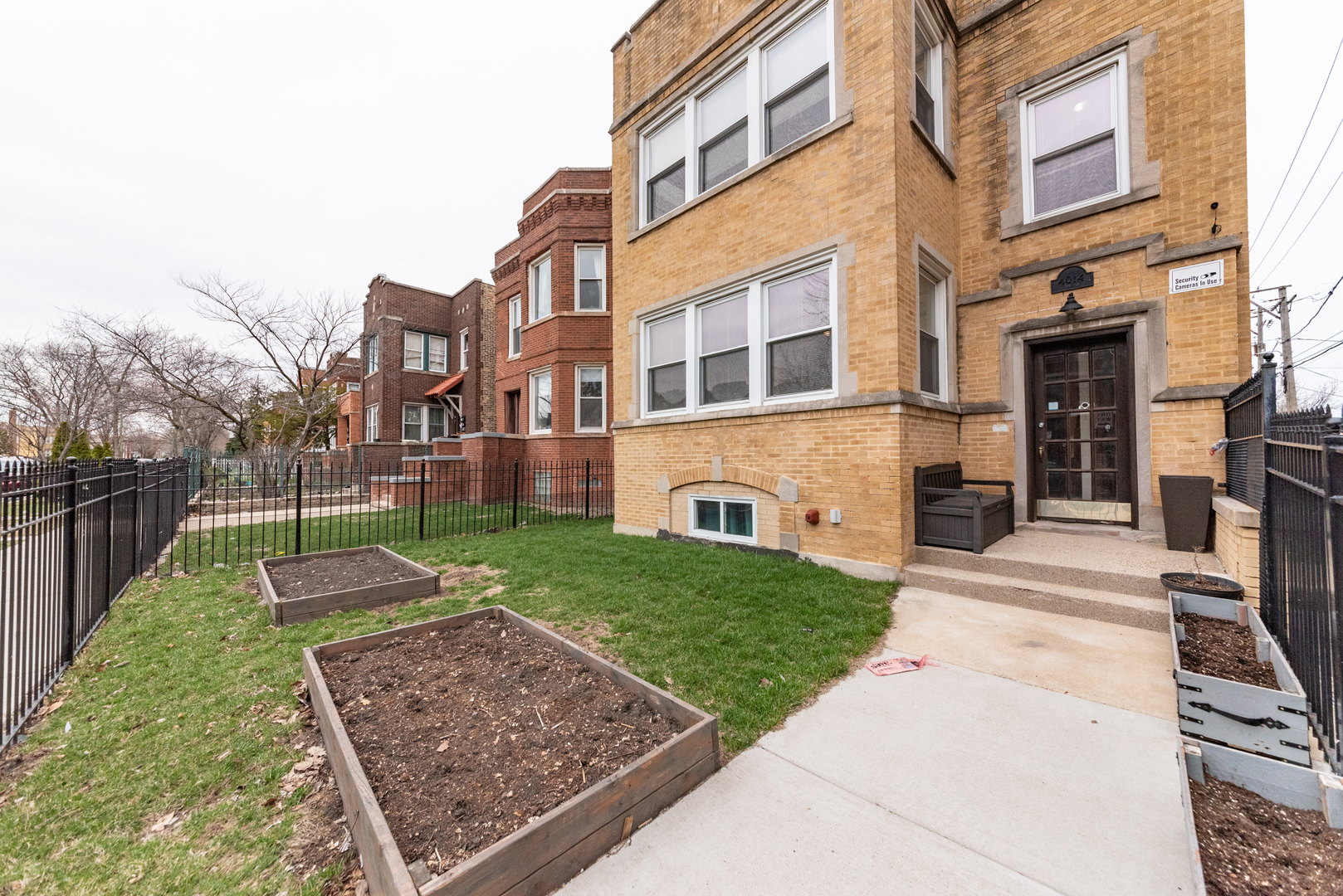 4014 West Nelson Street, Unit 1 Chicago, IL 60641 - Photo 21 of 21 a view of a yard in front of a building