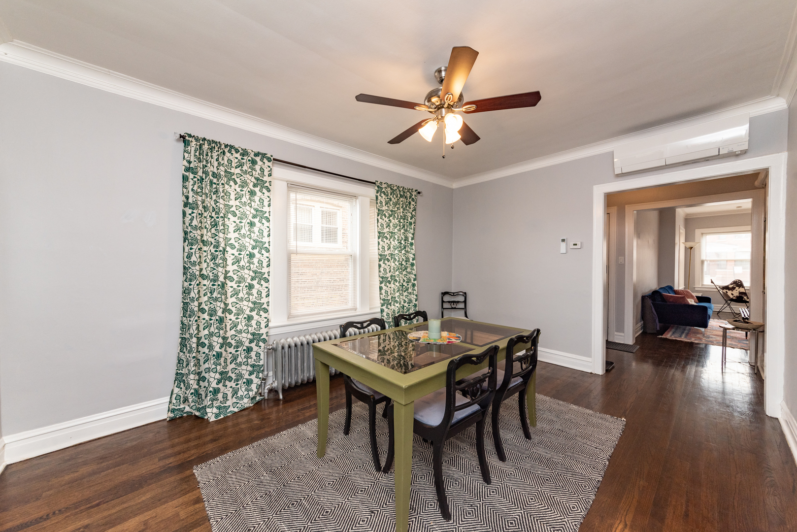 4014 West Nelson Street, Unit 1 Chicago, IL 60641 - Photo 7 of 21 a view of a livingroom with furniture and wooden floor