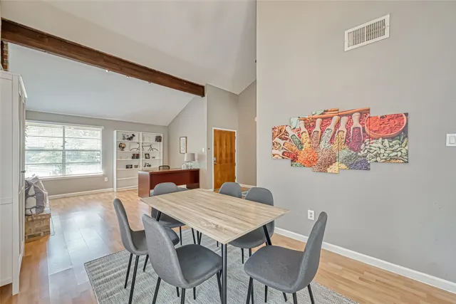 a view of a dining room with furniture