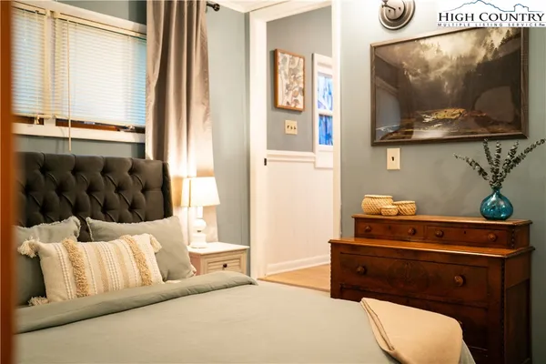 a living room with a couch and a flat screen tv