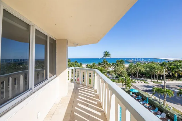 a view of a street from a balcony