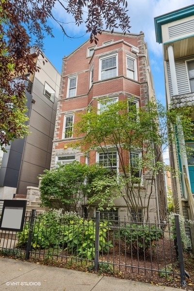1219 West Melrose Street, Unit 2 Chicago, IL 60657 - Photo 1 of 13 front view of a building
