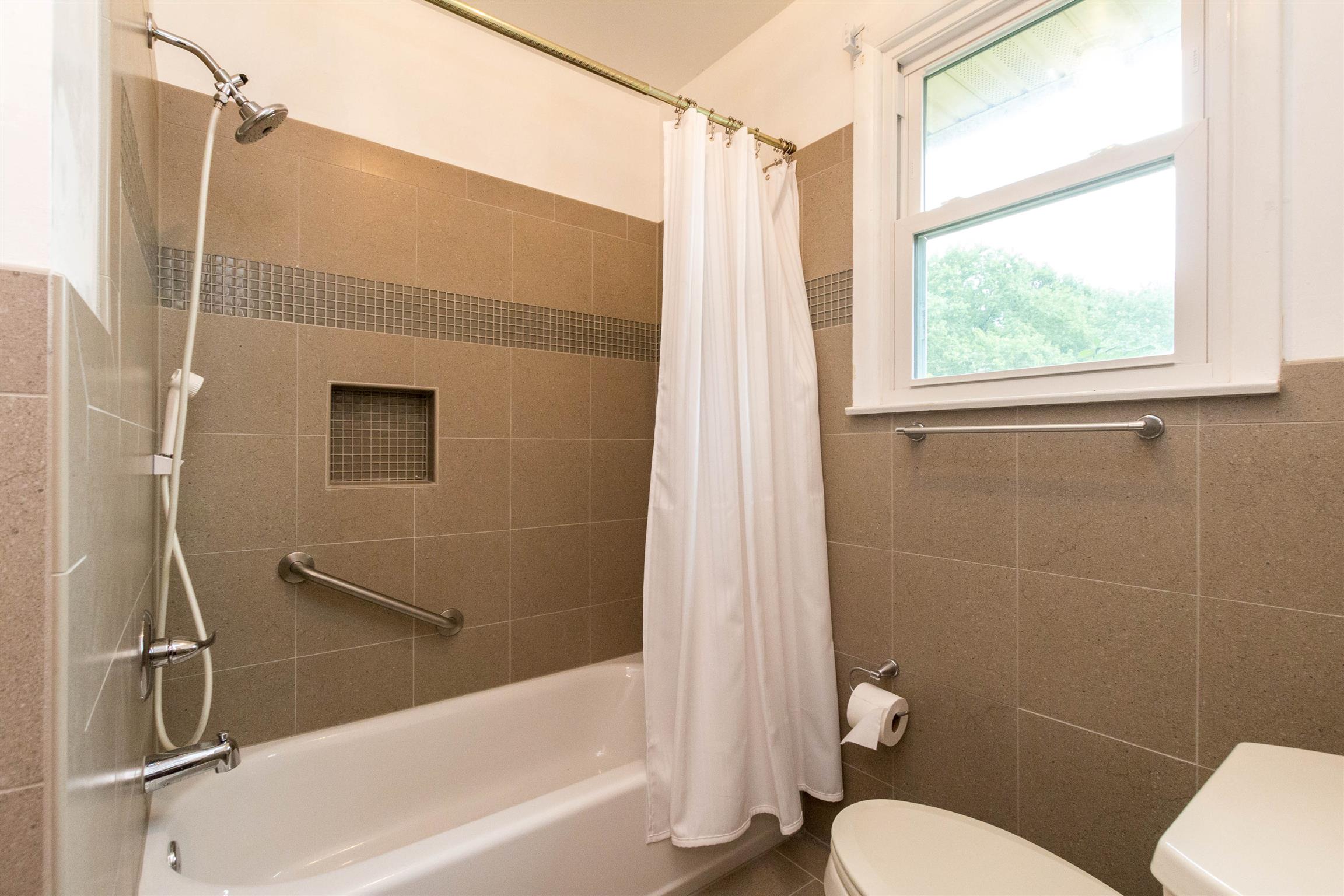 706 East Campbell Road Madison, TN 37115 - Photo 14 of 25 Bath has been remodeled with beautiful tile