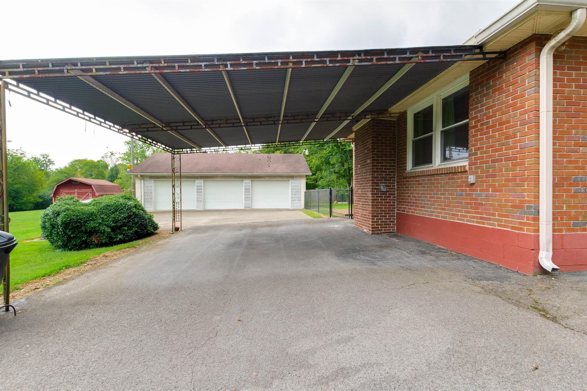 706 East Campbell Road Madison, TN 37115 - Photo 21 of 25 You can park under the carport or in your 3 car garage.