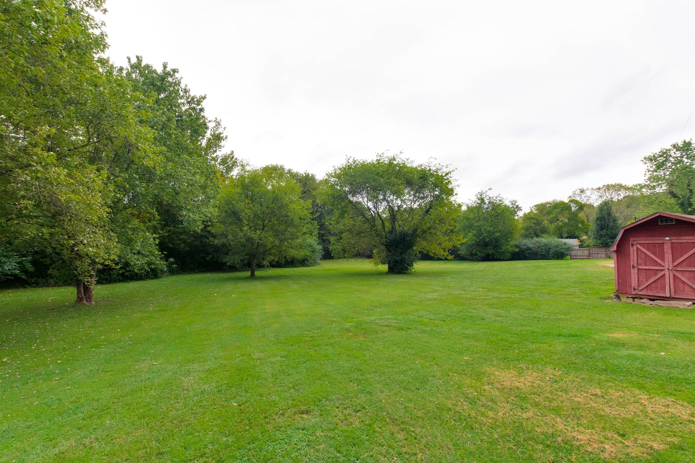 706 East Campbell Road Madison, TN 37115 - Photo 25 of 25 Amazing back yard. Storage barn is included as well