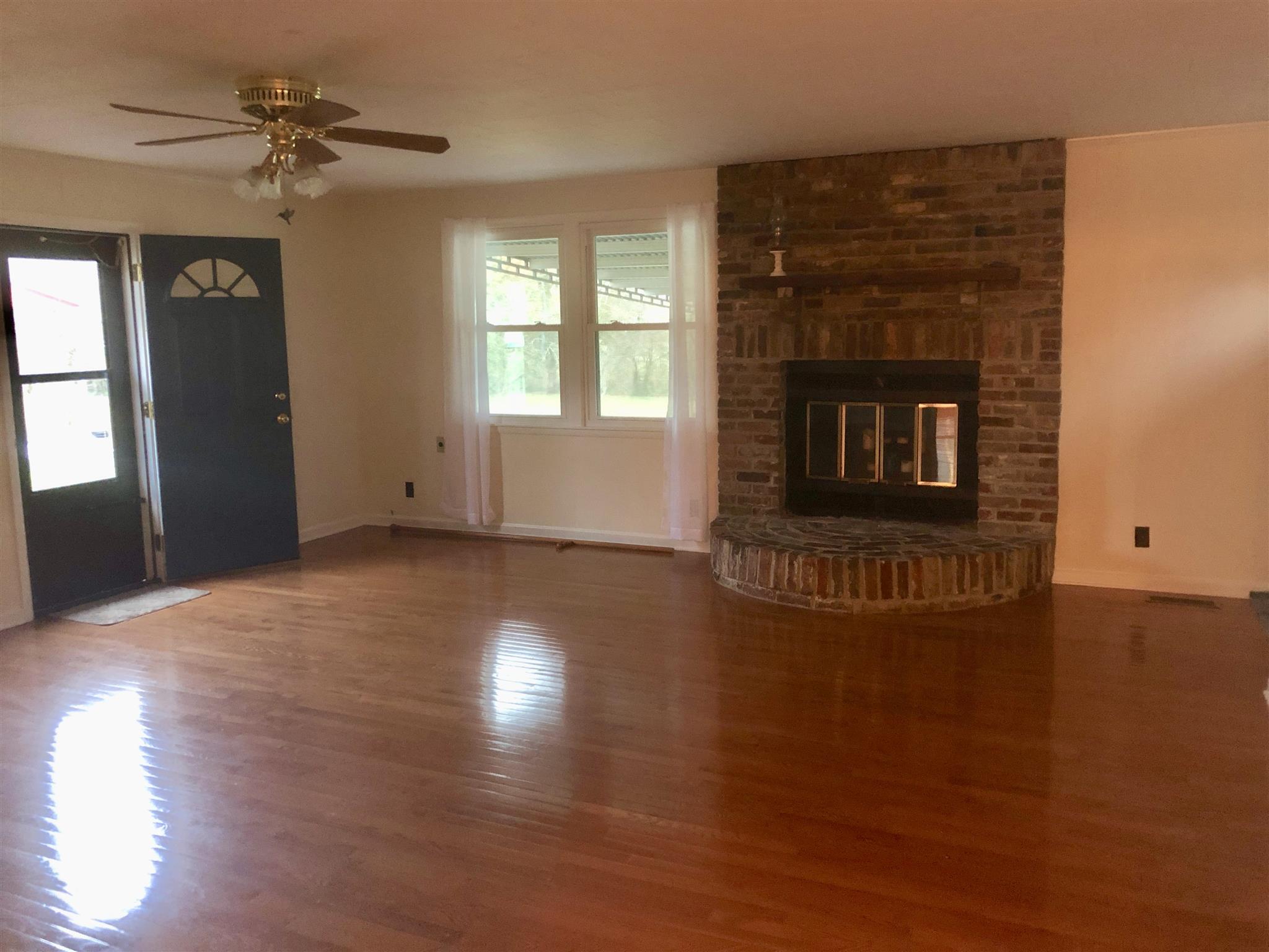 706 East Campbell Road Madison, TN 37115 - Photo 3 of 25 Spacious Great Room with brick fireplace.