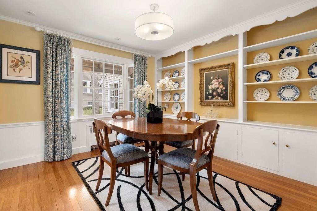 2 Lexington Avenue Lexington, MA 02421 - Photo 11 of 39 a view of a dining room with furniture and chandelier