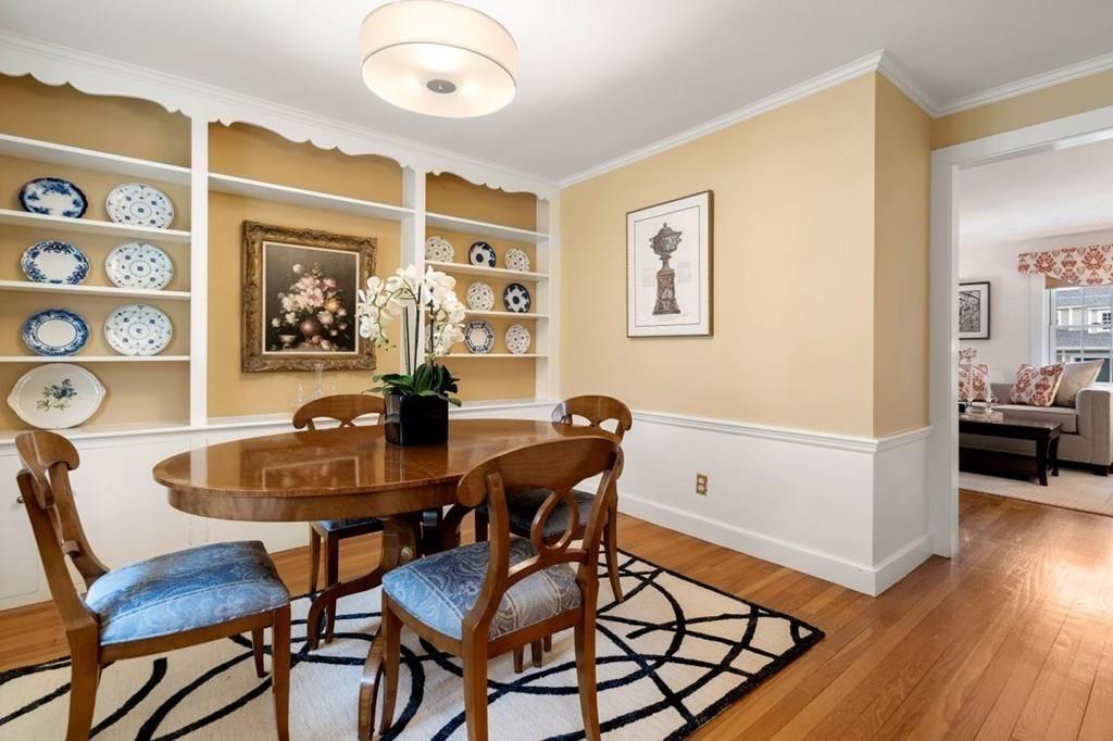 2 Lexington Avenue Lexington, MA 02421 - Photo 12 of 39 a view of a dining room with furniture and wooden floor